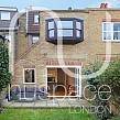 kitchen side extension chiswick with sloping roof and velux windows