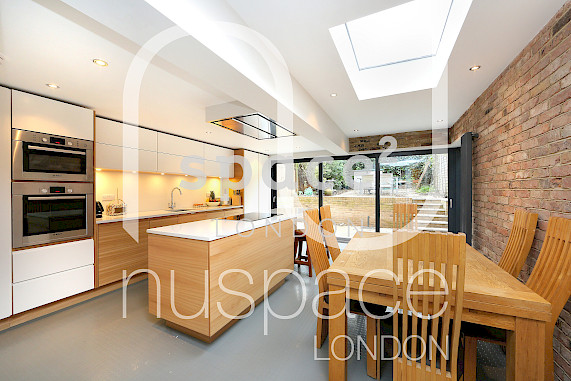 kitchen extension dulwich with flat roof and open brick work